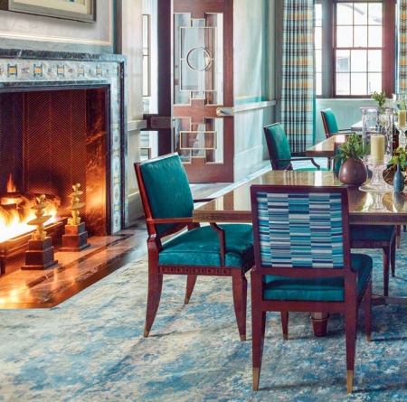 The andirons are an exceedingly pleasing fit within the overall feel of this Steven Gambrel designed home, as shown in this image from Galerie magazine. (Source image by Eric Piasecki.)
